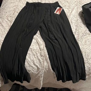 Black wide legged pants that Flow